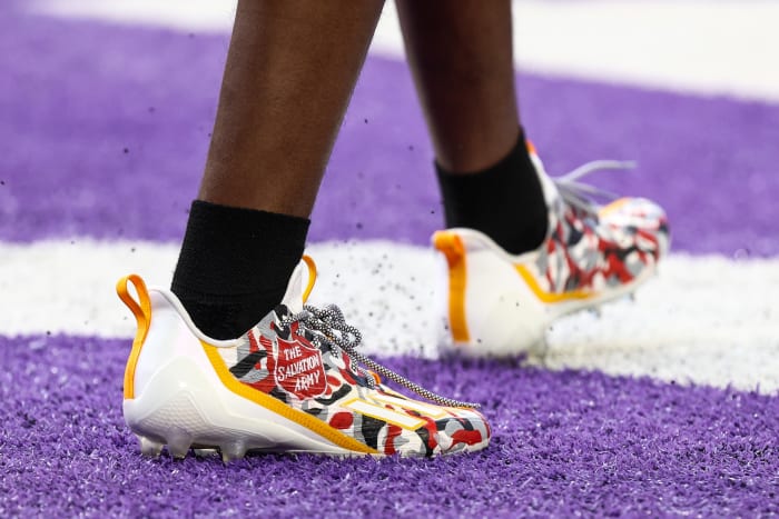View of red and white cleats.
